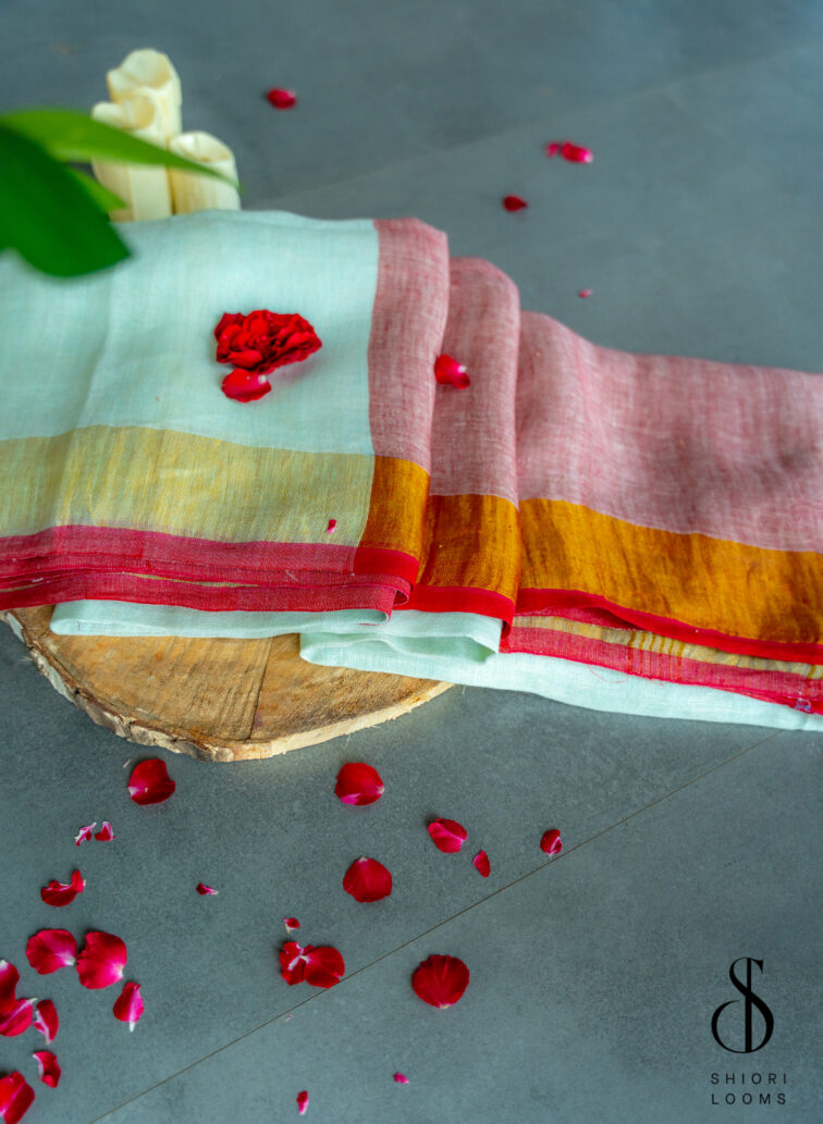 Handwoven Pastel Green Linen Saree with Golden Borders