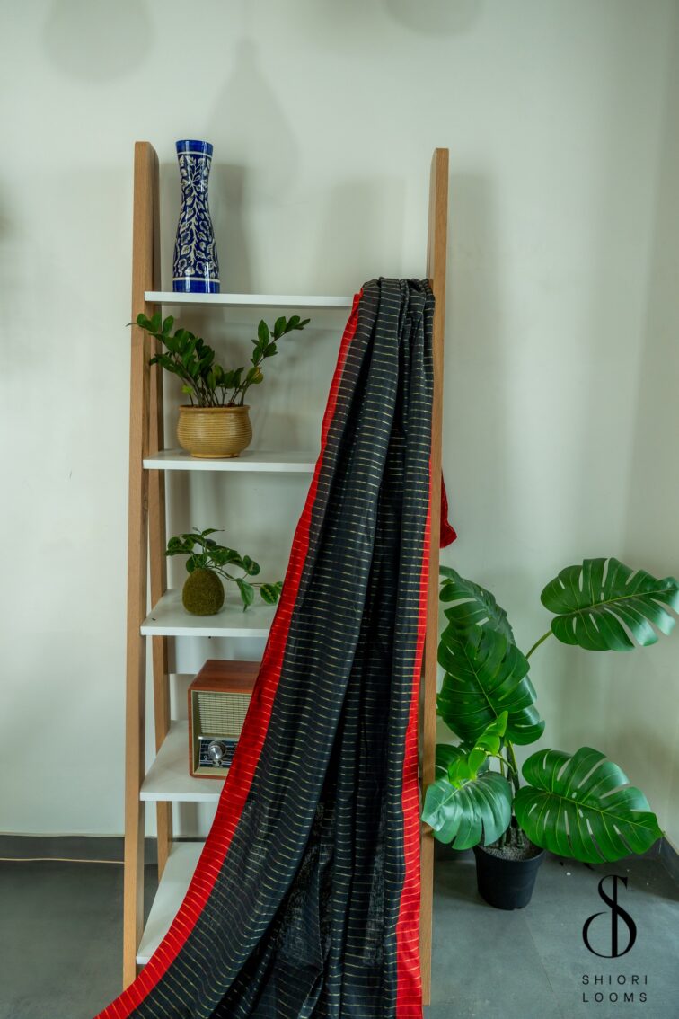 Handloom pure mul cotton saree in black with red border