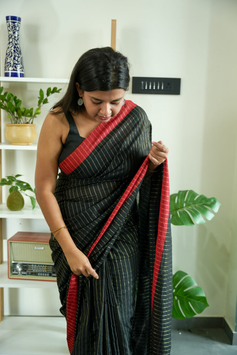 Handloom pure mul cotton saree in black with red border