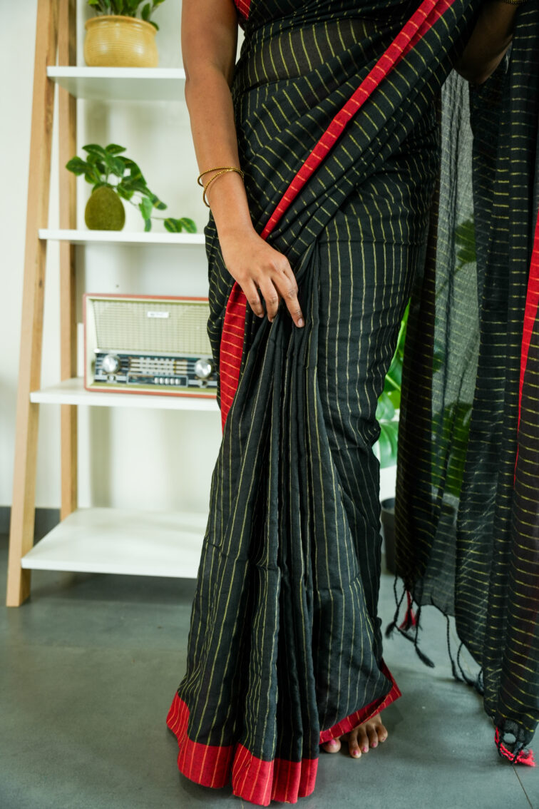 Handloom pure mul cotton saree in black with red border