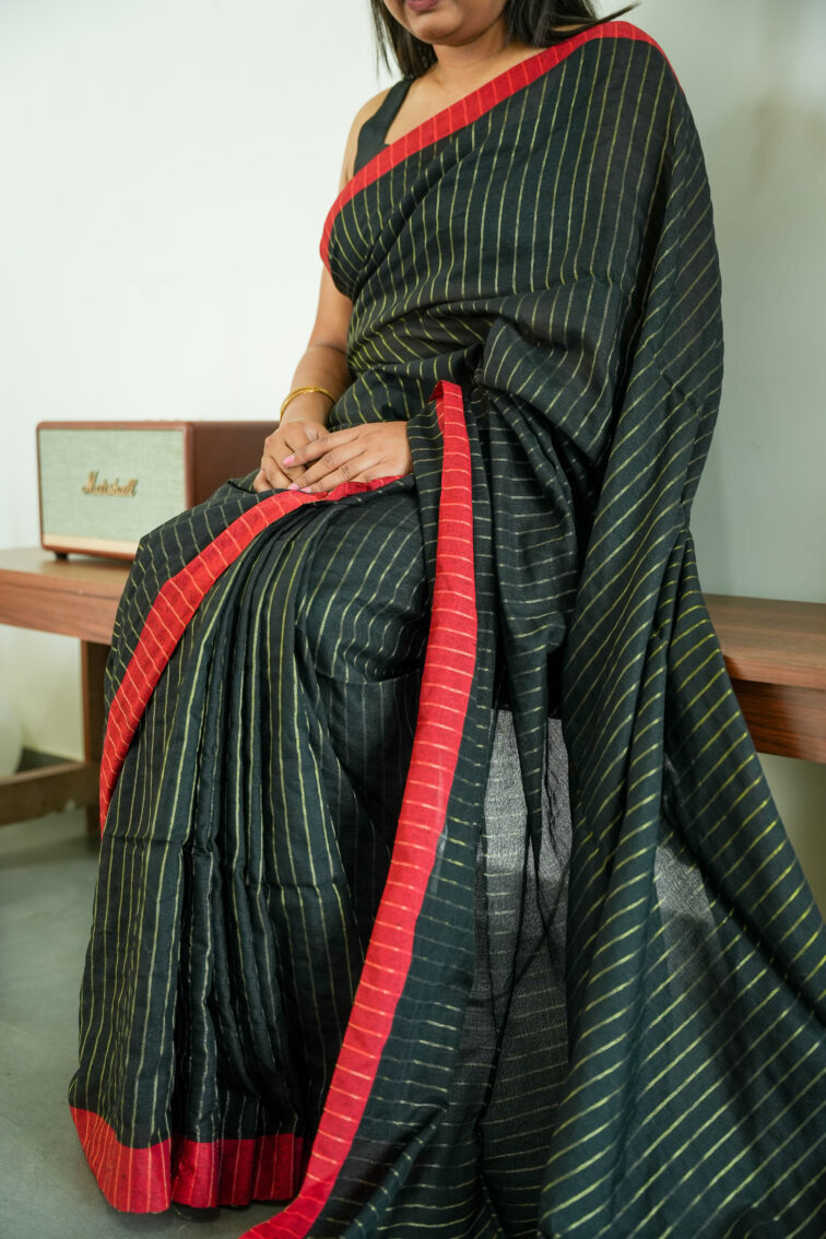 Handloom pure mul cotton saree in black with red border