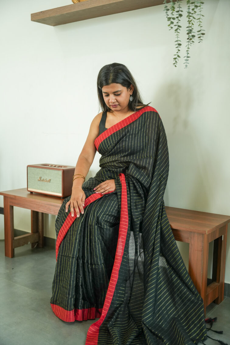 Handloom pure mul cotton saree in black with red border