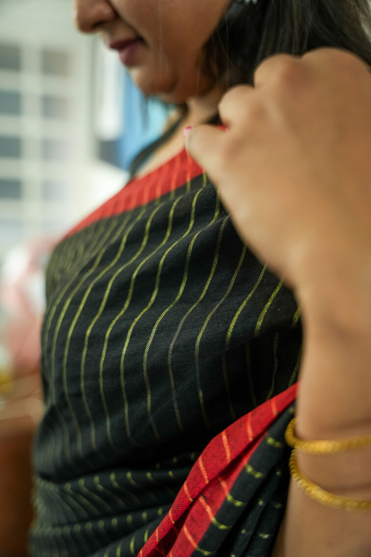 Handloom pure mul cotton saree in black with red border