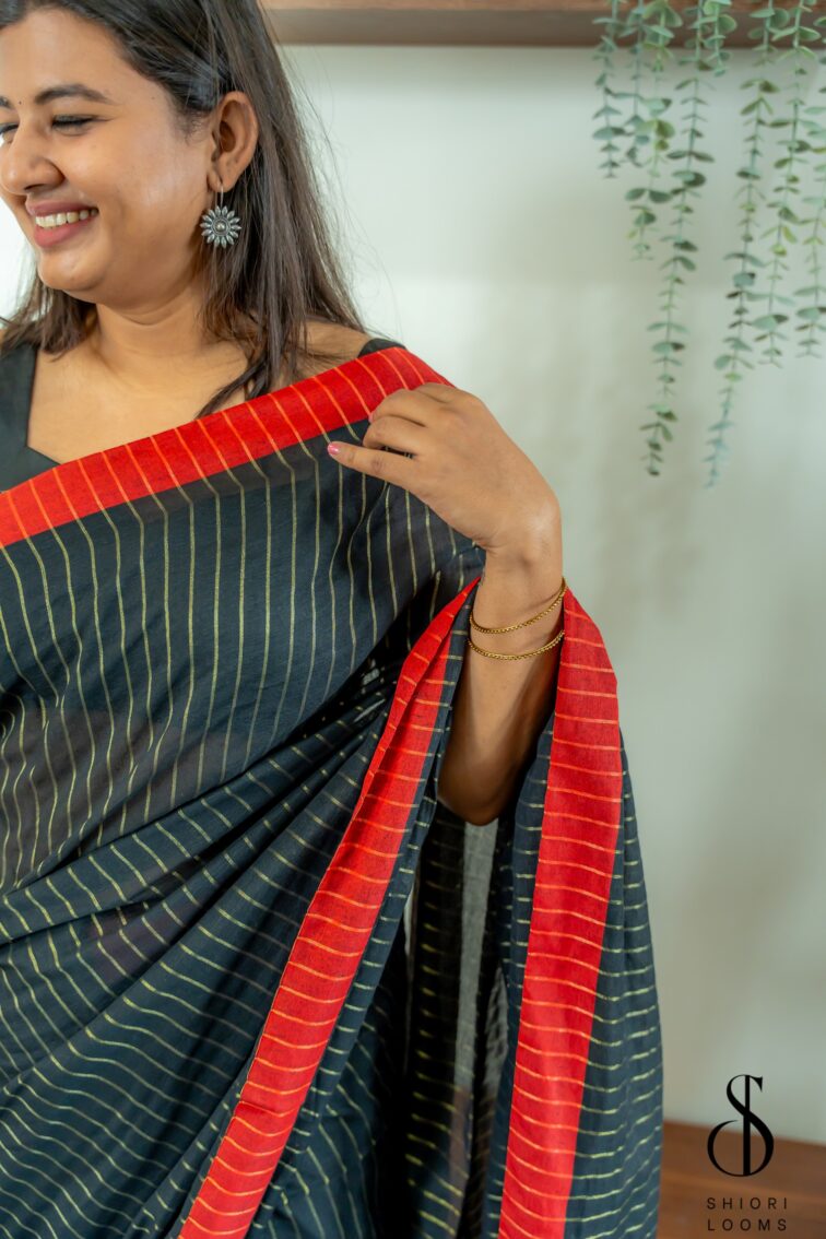 Handloom pure mul cotton saree in black with red border