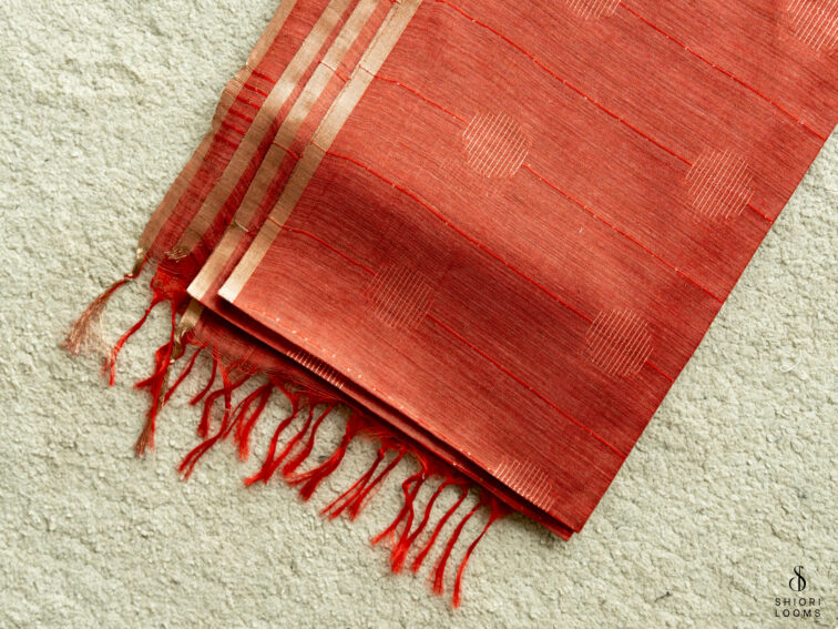 Handwoven Matka silk saree in rust orange