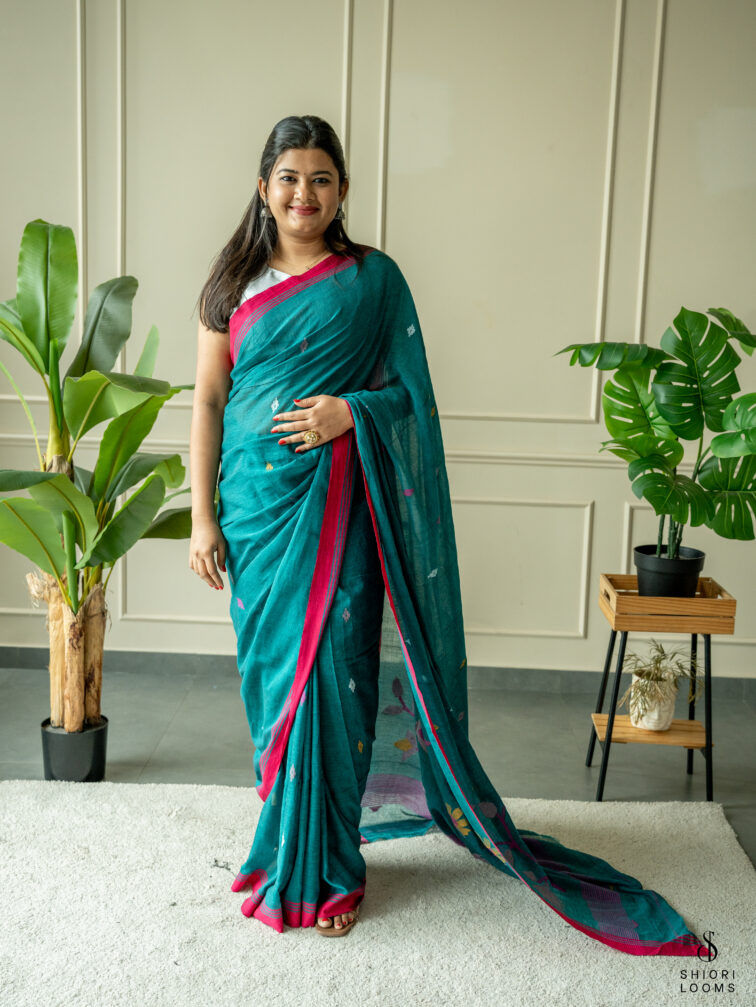 Handwoven Pure cotton Jamdani saree in dark green