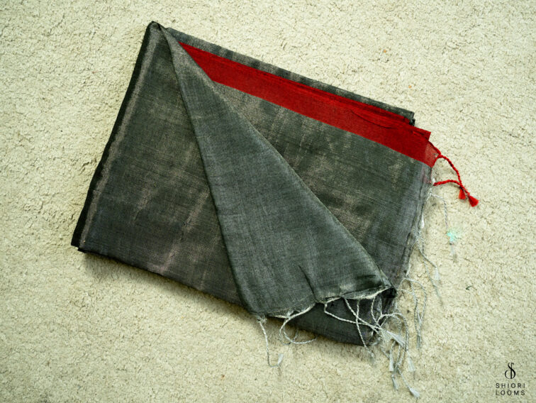 Handwoven cotton tissue saree in grey with red border