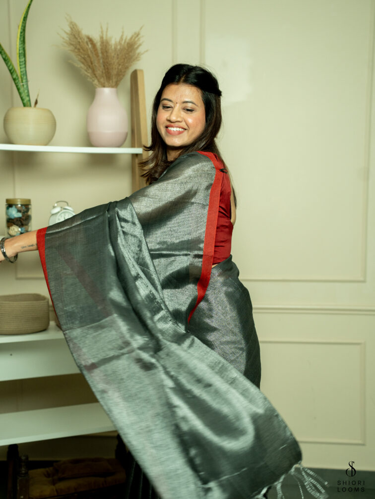 Handwoven cotton tissue saree in grey with red border