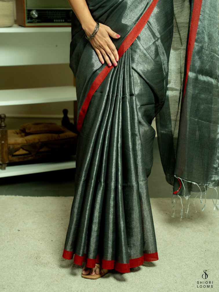Handwoven cotton tissue saree in grey with red border