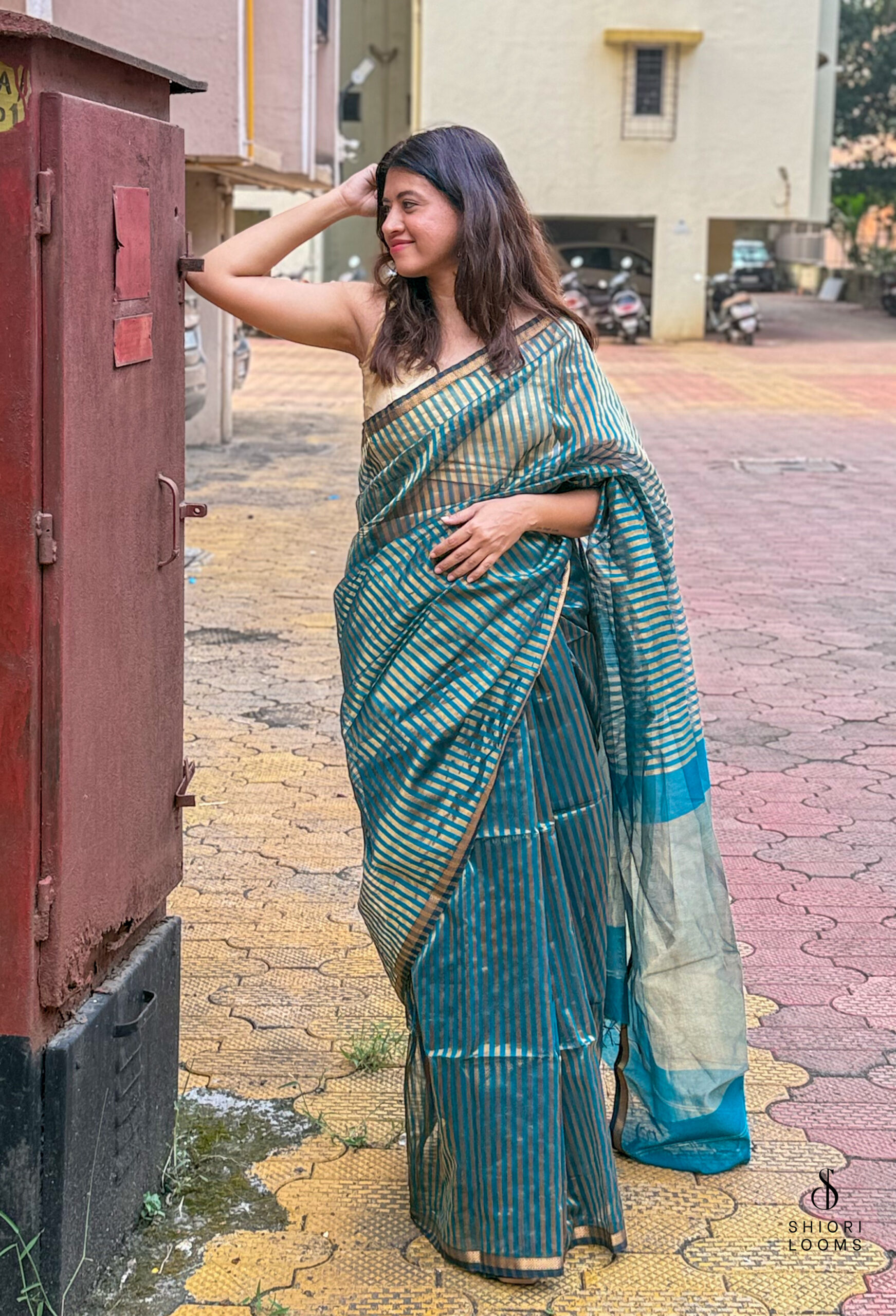 Handwoven Silk Cotton Maheshwari Saree in Peacock Blue with Tissue Stripes