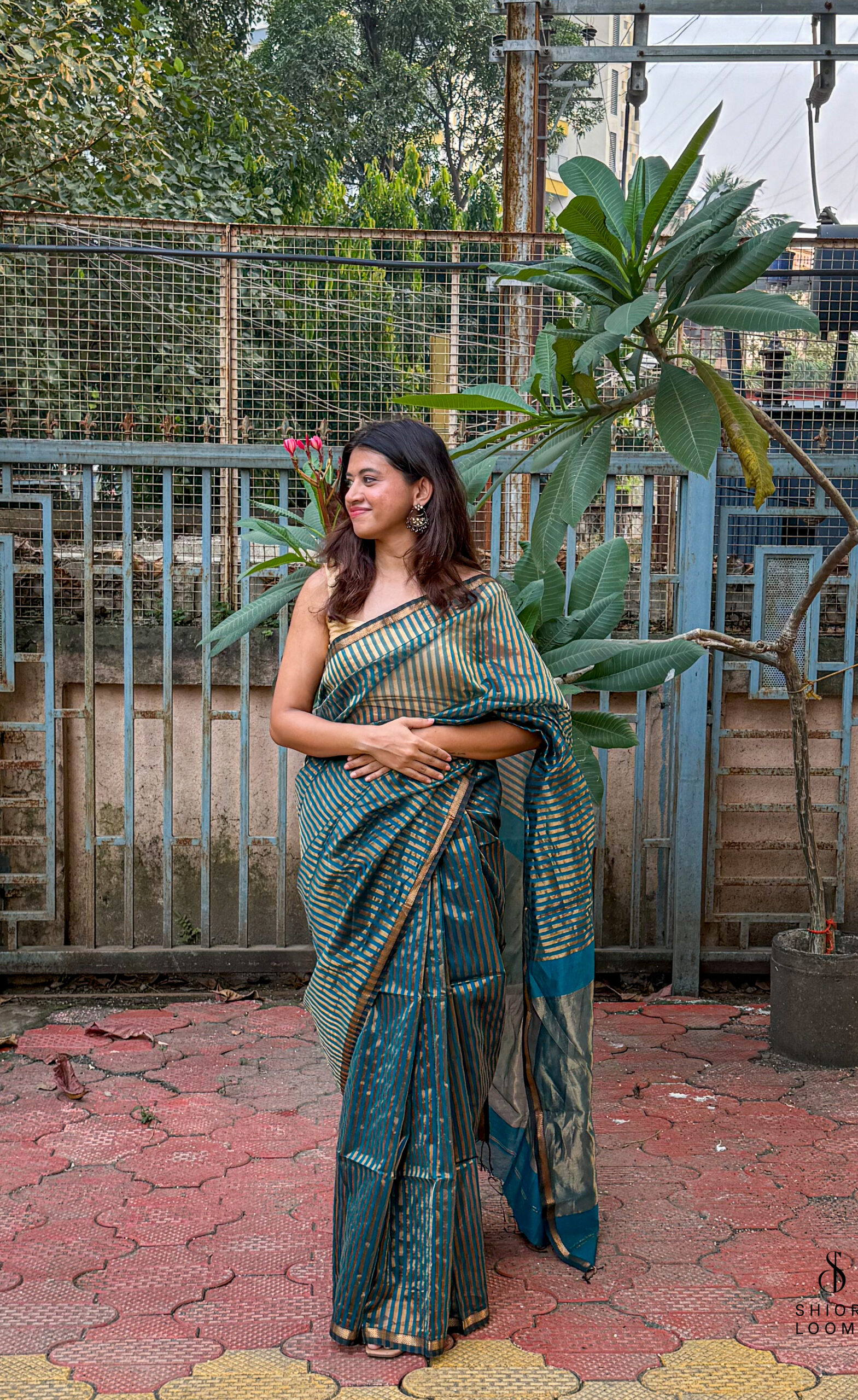 Handwoven Silk Cotton Maheshwari Saree in Peacock Blue with Tissue Stripes
