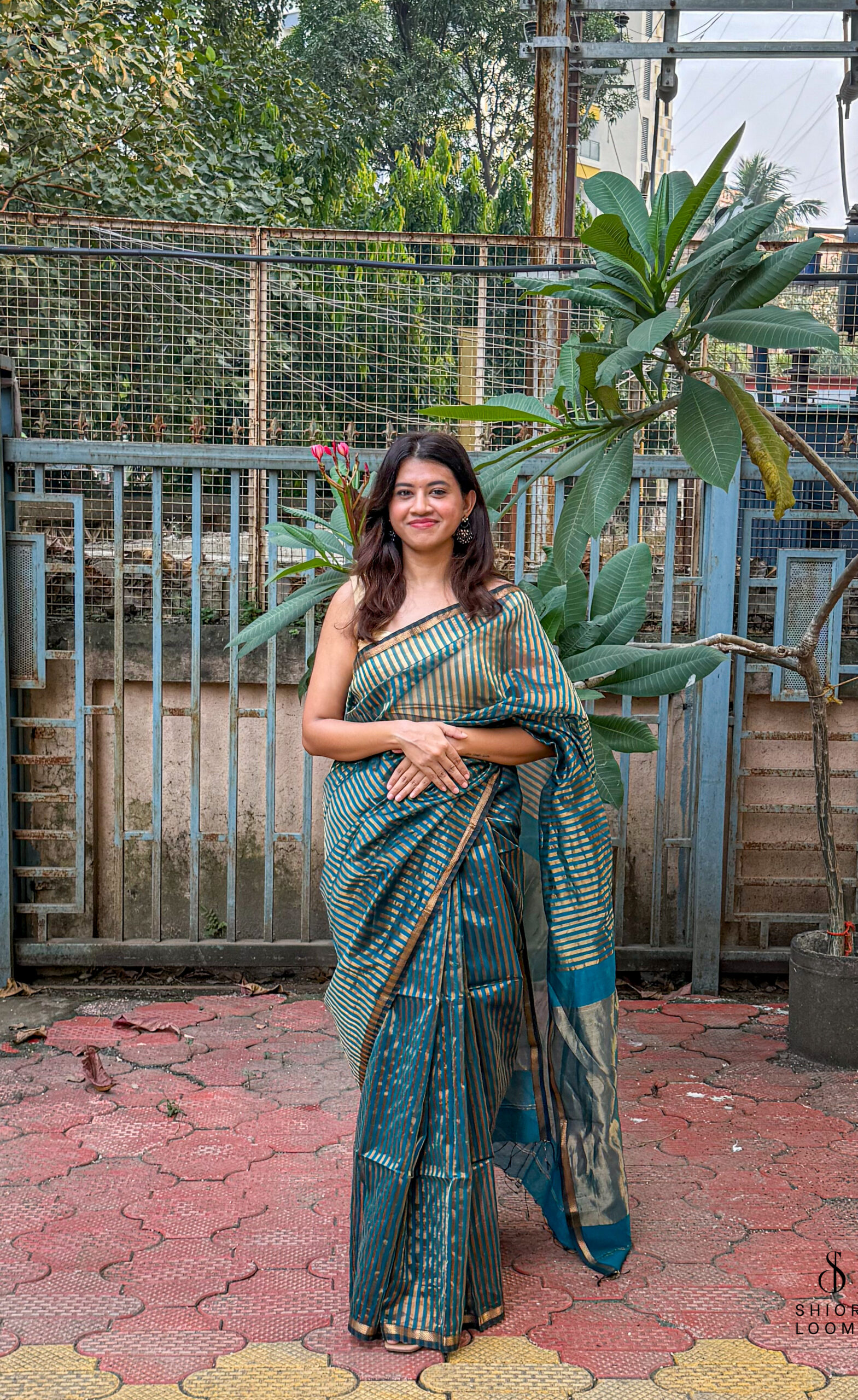 Handwoven Silk Cotton Maheshwari Saree in Peacock Blue with Tissue Stripes