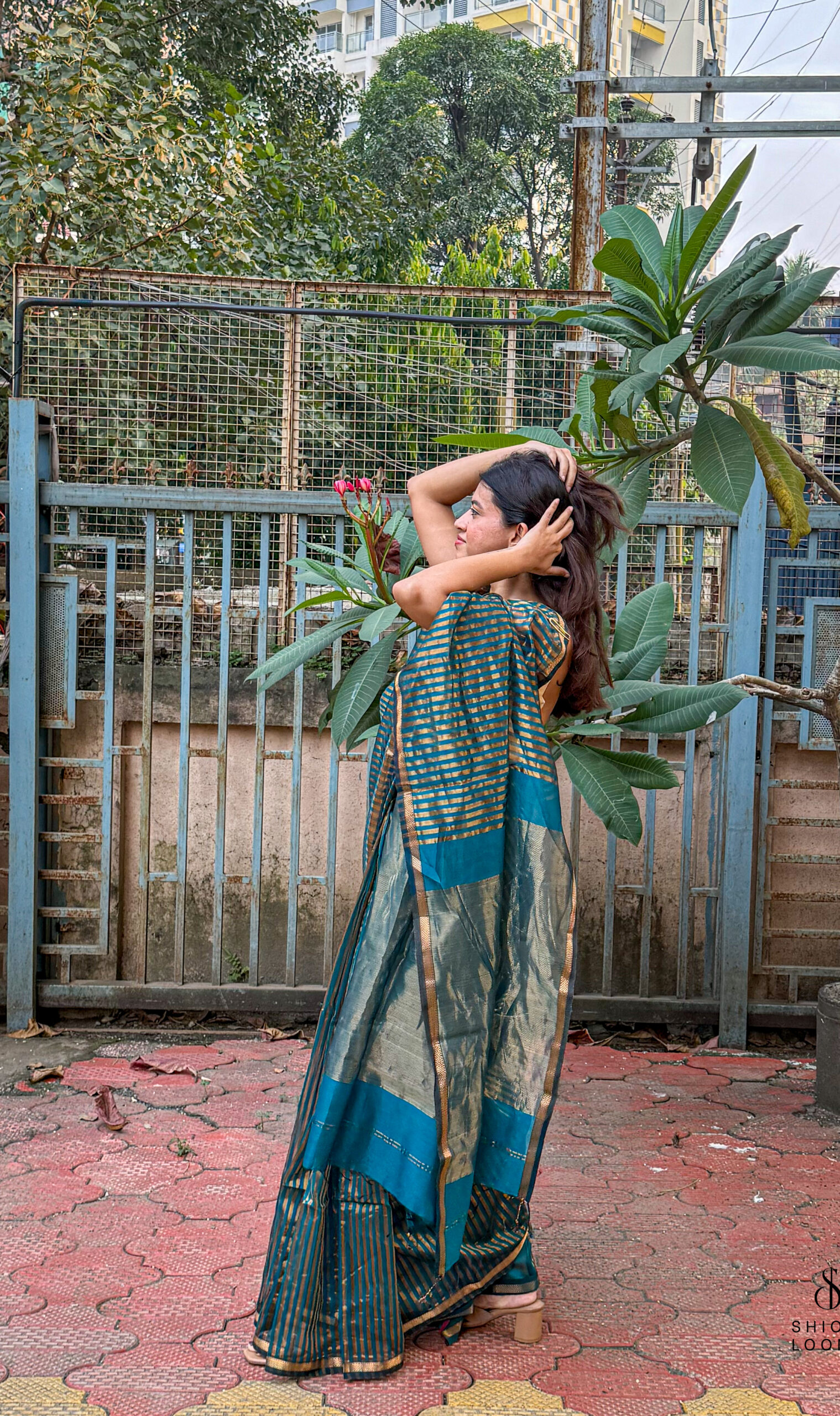 Handwoven Silk Cotton Maheshwari Saree in Peacock Blue with Tissue Stripes