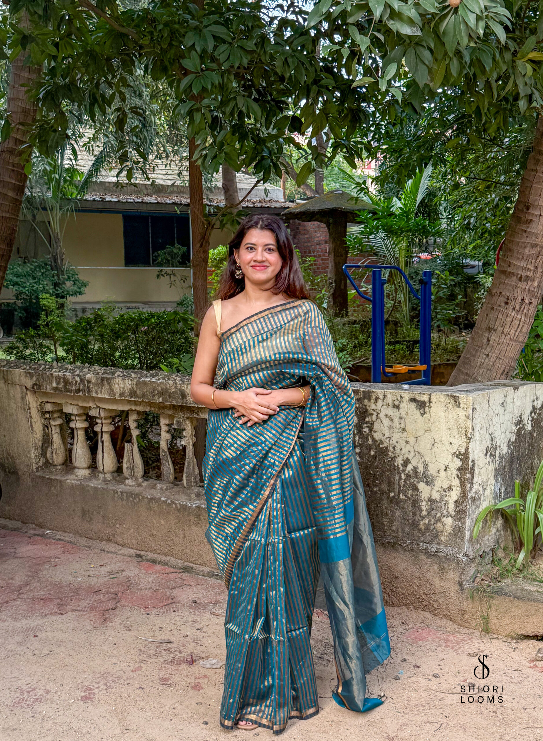 Handwoven Silk Cotton Maheshwari Saree in Peacock Blue with Tissue Stripes