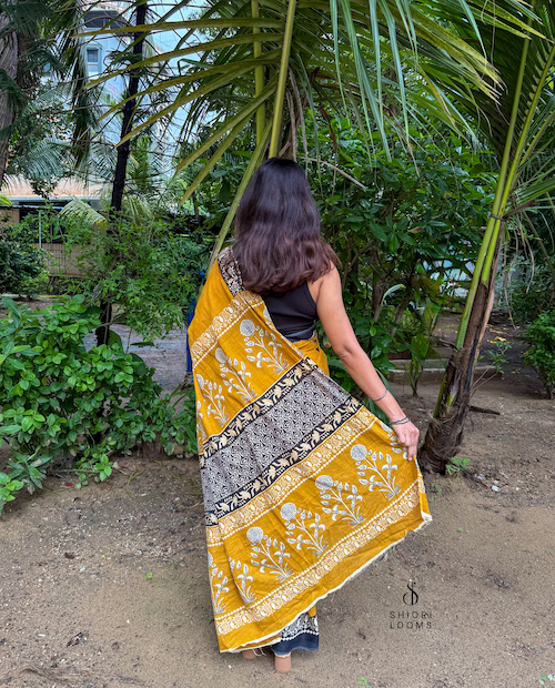 Handblock Printed Mul Cotton Saree in Mustard with Black Border